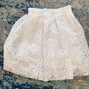 Beautiful white skirt with eyelit detail.